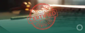 Red 'CERTIFIED' stamp over a stack of transcript pages with a gavel in the background, Optima Juris logo bottom right.